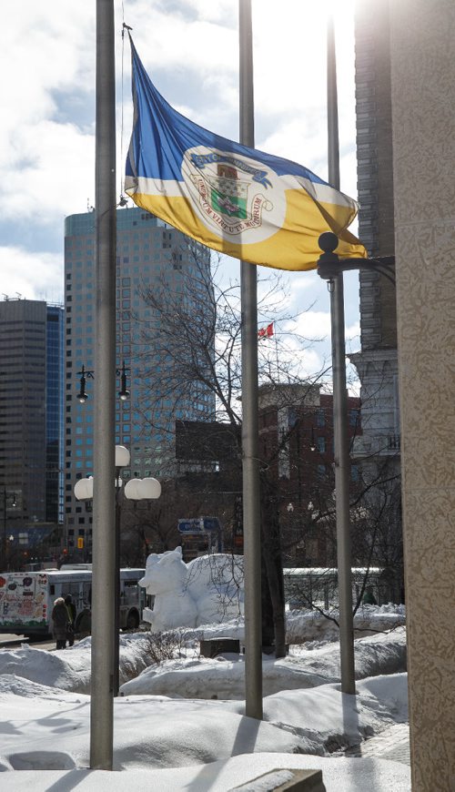 MIKE DEAL / WINNIPEG FREE PRESS
The flag at City Hall flies at half-mast in remembrance of the killing of a transit driver earlier in the day at the University of Manitoba.
170214 - Tuesday, February 14, 2017.