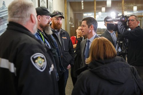 MIKE DEAL / WINNIPEG FREE PRESS
Winnipeg Mayor Brian Bowman expresses his condolences to coworkers of the transit driver who was killed earlier in the day at the University of Manitoba.
170214 - Tuesday, February 14, 2017.