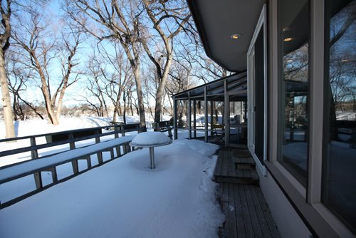 RUTH BONNEVILLE / WINNIPEG FREE PRESS

Homes - 900 Kildonan Drive.  Large riverfront  treed property home.     Realtor Glen MacAngus
Large front drive with balconies on front and rear of home with large deck and screened in porch.  
Feb 14, 2017
