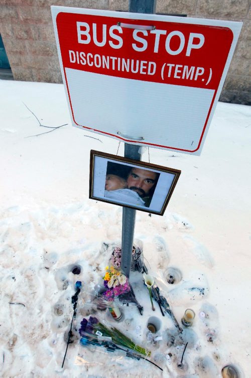 BORIS MINKEVICH / WINNIPEG FREE PRESS
Memorial at the U of M around the corner from where Winnipeg Transit driver Irvine Jubal Fraser was murdered. This was at a temporary bus stop set up around the corner while police investigated the scene yesterday. Feb. 15, 2017
