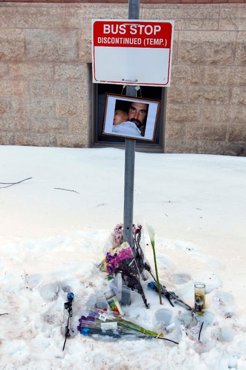 BORIS MINKEVICH / WINNIPEG FREE PRESS
Memorial at the U of M around the corner from where Winnipeg Transit driver Irvine Jubal Fraser was murdered. This was at a temporary bus stop set up around the corner while police investigated the scene yesterday. Feb. 15, 2017
