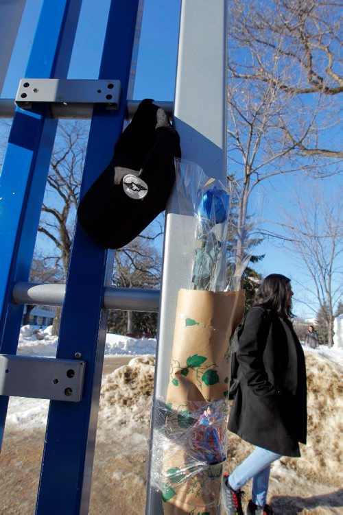 BORIS MINKEVICH / WINNIPEG FREE PRESS
Memorial at the U of M at the bus stop where Winnipeg Transit driver Irvine Jubal Fraser was murdered. Feb. 15, 2017