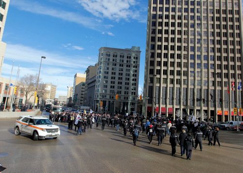 BORIS MINKEVICH / WINNIPEG FREE PRESS
Winnipeg Transit bus drivers held a rally at City Hall this morning. Transit employees and supports attended. Here they block off Portage and Main after the rally at City Hall. Feb. 17, 2017