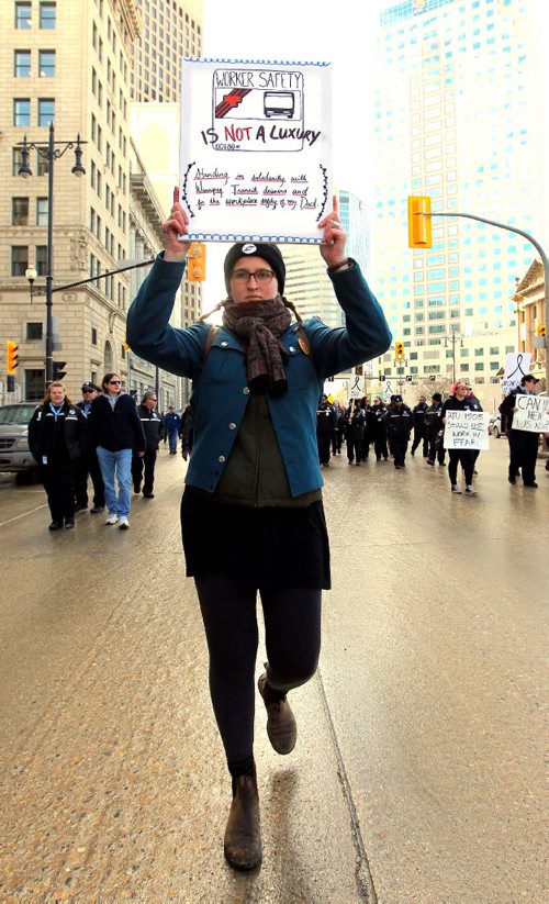 BORIS MINKEVICH / WINNIPEG FREE PRESS
Winnipeg Transit bus drivers held a rally at City Hall this morning. Transit employees and supports attended. (holding sign) Ashtyn Walker's dad is a bus driver and she came to the rally to support. Her dad was working, driving bus, at the time and could not attend. He has been with transit for 28 years and is to retire in June. Feb. 17, 2017