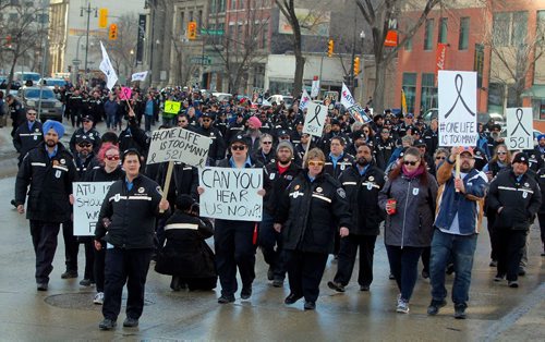 BORIS MINKEVICH / WINNIPEG FREE PRESS
Winnipeg Transit bus drivers held a rally at City Hall this morning. Transit employees and supports attended. Transit people march down Main Street. Feb. 17, 2017