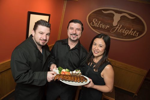 DAVID LIPNOWSKI / WINNIPEG FREE PRESS

(left to right) JC (co-owner), Tony (co-owner), and Sue Siwicki (General Manager) of Silver Heights Restaurant hold a plate of ribs, as the establishment celebrates its 60th anniversary this year. Photographed February 17, 2017. 

David Sanderson intersection story