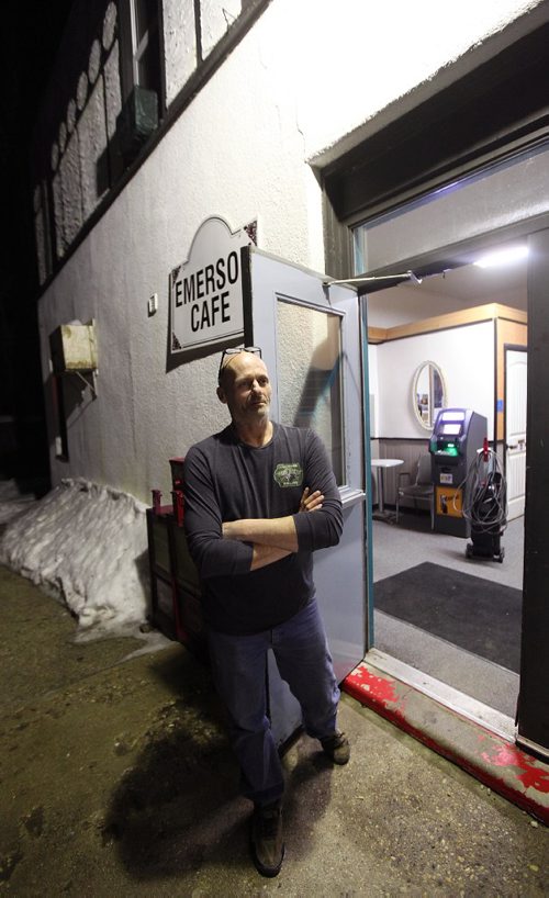PHIL HOSSACK / WINNIPEG FREE PRESS  -   Wayne Pfiel stands in the doorway of the Emerson Inn where he manages the bar and keeps a watch out for refugees making the trek across snow covered fields. See Mike MacIntyre story- February 16, 2017