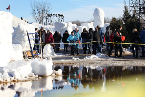 RUTH BONNEVILLE / WINNIPEG FREE PRESS

Large pools of water are partitioned off for people to walk around at the   Festival du Voyageur  Saturday. 
Standup photo 
Feb 18, 2017
