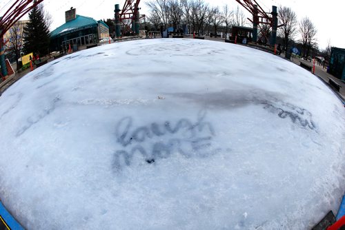 JOHN WOODS / WINNIPEG FREE PRESS
The ice rink begins to melt because of the unusually warm winter weather at the Forks Sunday, January 19, 2017.