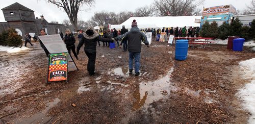 PHIL HOSSACK / WINNIPEG FREE PRESS  -  Festival goers had to deal with mud and puddles at a soggy Fort Gibralter site. See Alex Paul story. - February 20, 2017
