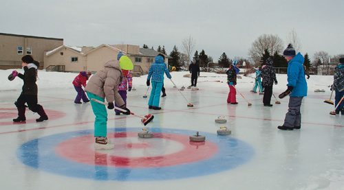 Canstar Community News Feb. 13, 2017 - Ella Schmidt, Grade 4, calls a shot for one of her teammates during gym class at Donwood School (400 Donwood Dr.). The school held its annual bonspiel on Feb. 14. (SHELDON BIRNIE/CANSTAR/THE HERALD).