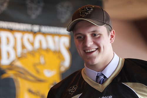 RUTH BONNEVILLE / WINNIPEG FREE PRESS

Seventeen-year-old Cole Adamson smiles while talking with his family after signing with the Manitoba Bisons football team as a defensive player at press confers e at Smitty's Restaurant Thursday.  

See Mike Sawatsky's story.




Feb 23, 2017
