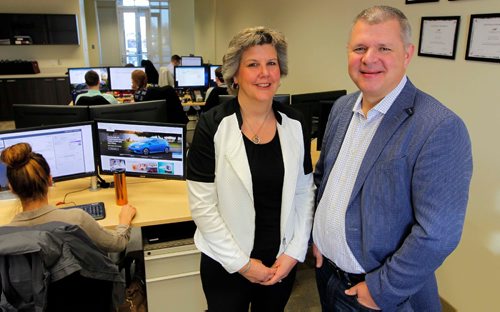 BORIS MINKEVICH / WINNIPEG FREE PRESS
DMT Technologies, at 500 One Research Road (U of M Smartpark). From left standing: Sharon and Glen Demetrioff pose for a photo at their business. Behind them is workers dealing with customers and car dealerships. This is for Manitoba 150, business innovators, a look at innovations/milestones past, present and future. DMT supplies the global automotive industry with online sales, lead generation and media websites. February 24, 2017