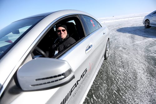 TREVOR HAGAN / WINNIPEG FREE PRESS
Kelly Taylor and other automotive journalists from across Canada taking part in the Mercedes AMG Winter Driving Academy event on Lake Winnipeg at Gimli Manitoba, Friday, February 15, 2017. A few different AMG models were available with studded tires to try on 3 famous race tracks recreated on the ice. Each car ran studded tires with about 400 studs per tire.