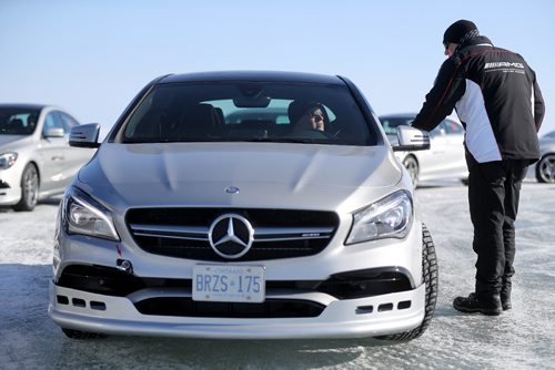 TREVOR HAGAN / WINNIPEG FREE PRESS
Kelly Taylor and other automotive journalists from across Canada taking part in the Mercedes AMG Winter Driving Academy event on Lake Winnipeg at Gimli Manitoba, Friday, February 15, 2017. A few different AMG models were available with studded tires to try on 3 famous race tracks recreated on the ice. Each car ran studded tires with about 400 studs per tire.