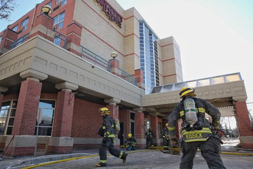 MIKE DEAL / WINNIPEG FREE PRESS
Firefighters respond to a fire in the Norwood Hotel Sunday. A firefighter was reportedly injured though no condition was given. No report on the damage. 
170226
Sunday, February 26, 2017