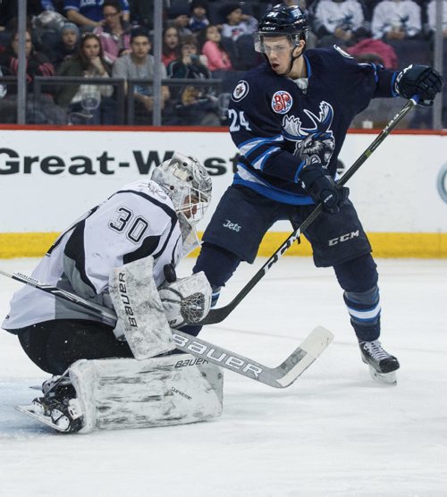 MIKE DEAL / WINNIPEG FREE PRESS
Manitoba Moose' Scott Kosmachuk (24) watches for the loose puck as it bounces off San Antonio Rampage' goaltender Spencer Martin (30) in AHL season action at the MTS Centre Sunday afternoon. 
170226 - Sunday, February 26, 2017.
