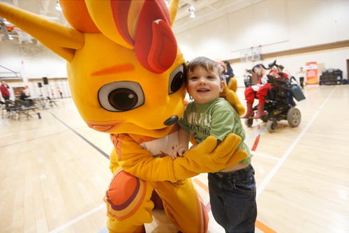 JOHN WOODS / WINNIPEG FREE PRESS
Two year old Cade Andrew gets a hug from Niibin, the 2017 Canada Summer Games mascot, at the 2017 Canada Games Ceremonies performer auditions at the University of Manitoba Sunday, February 26, 2017.