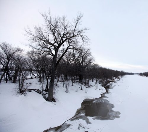PHIL HOSSACK / WINNIPEG FREE PRESS  - Open water creeps up past the ice edges on the riverbank near Emerson. See story.  - February 27, 2017