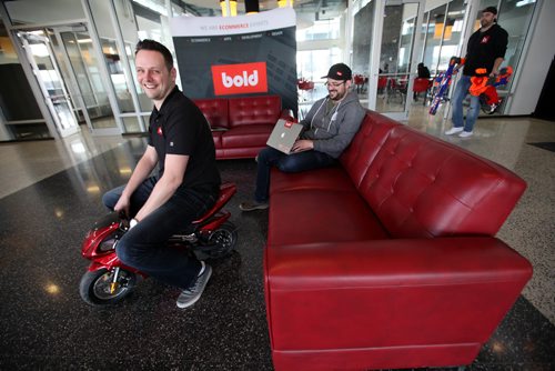 RUTH BONNEVILLE / WINNIPEG FREE PRESS

BOLD Commerce

Bold owners Jason Myers (front right), Eric Boisjoli (centre), Stefan Maynard and Yvan Boisjoli (not in photo), love to play as hard as they work.  Photo of 3 of the 4 owners in front foyer with their toy shooters.  
Story:. BOLD is a ecommerce business that develop Shopify apps, basic online store setups to complete custom design and development solutions.  
This is running with Kelly Taylor's 49.8 feature on Manitoba 150. Innovation and technology advances in MB.
Feb 25, 2017
