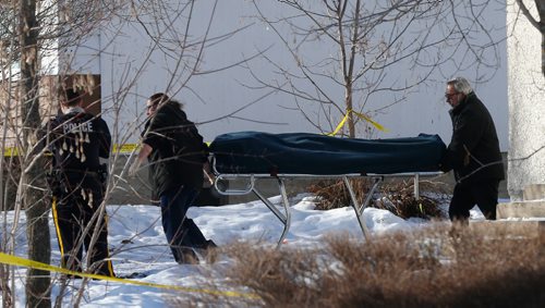 WAYNE GLOWACKI / WINNIPEG FREE PRESS

One of two bodies is removed from the scene of a double homicide at a house in St-Georges, Mb. Tuesday. Bill Redekop  story Feb. 28   2017