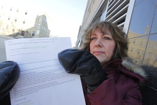 BORIS MINKEVICH / WINNIPEG FREE PRESS
LOCAL - Joanne Lussier-Demers poses for a photo with a copy of an email in regards to a dispute she is having with Unicity Taxi. Ashley Prest story. March 1, 2017 170301