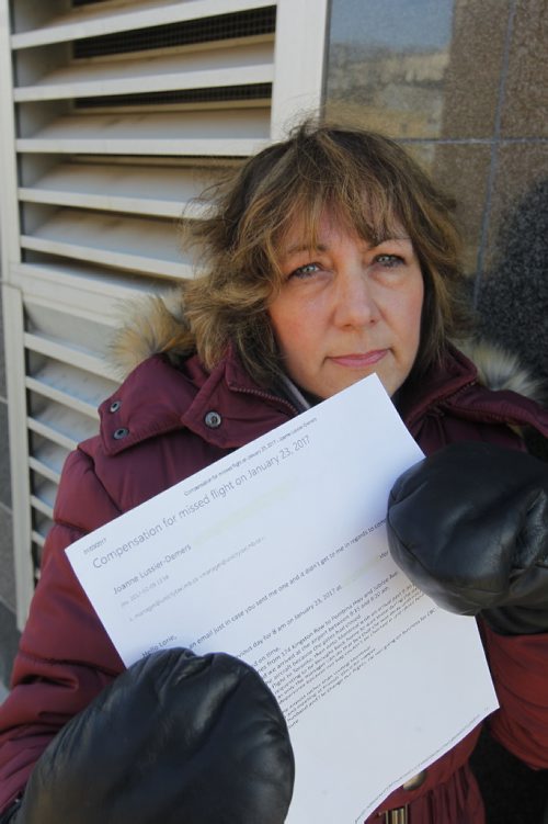 BORIS MINKEVICH / WINNIPEG FREE PRESS
LOCAL - Joanne Lussier-Demers poses for a photo with a copy of an email in regards to a dispute she is having with Unicity Taxi. Ashley Prest story. March 1, 2017 170301