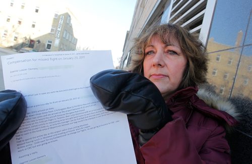 BORIS MINKEVICH / WINNIPEG FREE PRESS
LOCAL - Joanne Lussier-Demers poses for a photo with a copy of an email in regards to a dispute she is having with Unicity Taxi. Ashley Prest story. March 1, 2017 170301