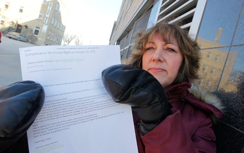 BORIS MINKEVICH / WINNIPEG FREE PRESS
LOCAL - Joanne Lussier-Demers poses for a photo with a copy of an email in regards to a dispute she is having with Unicity Taxi. Ashley Prest story. March 1, 2017 170301