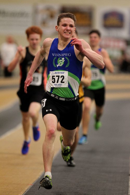 RUTH BONNEVILLE / WINNIPEG FREE PRESS

Jack Taylor of Winnipeg sprints across the finish line after coming in 1st in his 400M heat at the Boeing Indoor Classic at the U of M Friday.  

  March 03, 2017