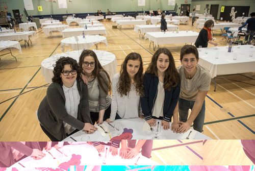 DAVID LIPNOWSKI / WINNIPEG FREE PRESS

(Left to Right) Volunters Noya Haims, Romi Haims, Lise Conner, Lena Steinberg, Uri Faingold, set up a Shabbat table at the Rady Jewish Community Centre Friday March 3, 2017 in preparation for a community wide Shabbat dinner where 400 attendees are expected. Winnipeg synagogues are cooperating on this event, and similar events  across Canada and the US are happening on Friday night as well. 
