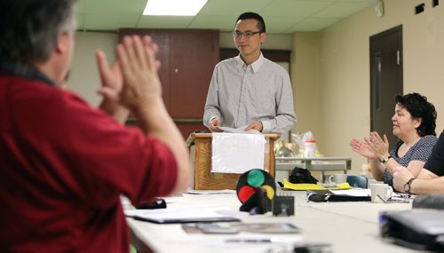 JASON HALSTEAD / WINNIPEG FREE PRESS

Pauling Cheng of the Friendly Time Toastmasters Club speaks at St. Edwards Church in the West End on March 4, 2017. The 12-member group that gets together at the church every second Saturday.
RE: Sanderson Intersection story