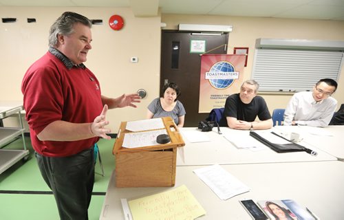 JASON HALSTEAD / WINNIPEG FREE PRESS

Wayne Stanton (left) of the Friendly Time Toastmasters Club speaks at St. Edwards Church in the West End on March 4, 2017. The 12-member group that gets together at the church every second Saturday.
RE: Sanderson Intersection story