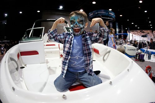 JOHN WOODS / WINNIPEG FREE PRESS
Four year old Aidan Bohonis shows off his muscles in a boat at the Boat Show in the downtown convention centre Sunday, March 5, 2017.