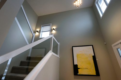 WAYNE GLOWACKI / WINNIPEG FREE PRESS

Homes. The view of the staircase from the front entrance at 41 Eagleview Drive in Prairie Pointe.   Signature Homes sales rep is Jeff McArthur.  Todd Lewys ¤ story March 6   2017