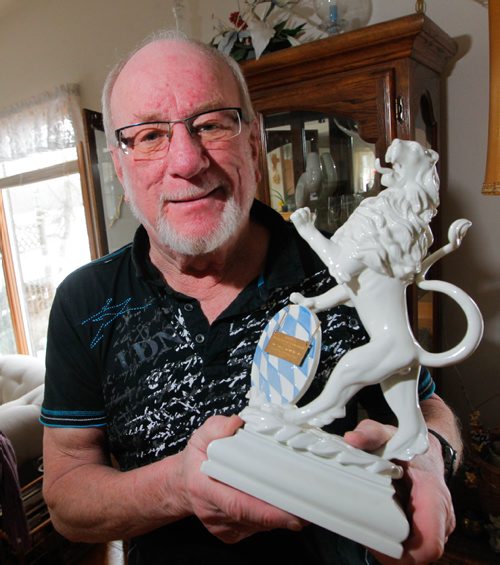 BORIS MINKEVICH / WINNIPEG FREE PRESS
SPORTS - Orest Meleschuk, winner of the 1972 Brier, poses for a photo in his home in Selkirk, MB. Here he holds the trophy that each of the team members got for winning. JASON BELL STORY March 6, 2017 170306