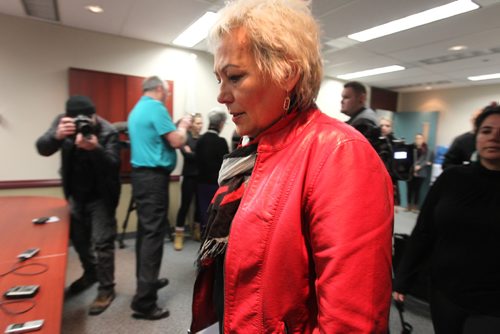 RUTH BONNEVILLE / WINNIPEG FREE PRESS

MMIWG coalition members Sandra Delaronde co-chair (in red),makes her way into the room as Angie Hutchinson and Hilda Anderson-Pyrz follow at press conference to discuss numerous issues and concerns at Assembly of Manitoba Chiefs office Tuesday.    
In attendance speaking to the media were Sandra Delaronde co-chair,  Angie Hutchinson member and Hilda Anderson-Pyrz co-chair (glasses). 
See Alex Paul story.  
March 07, 2017