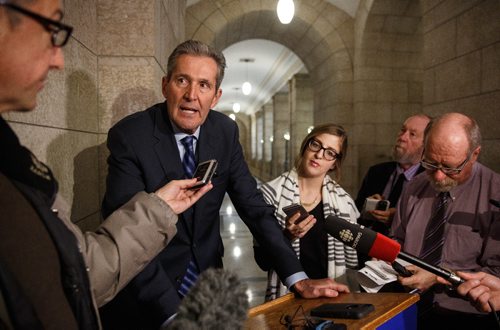 MIKE DEAL / WINNIPEG FREE PRESS
Premier Brian Pallister during a scrum with media after question period discussing the announcement by Manitoba Hydro that the cost of constructing the Keeyask hydro generating station in northern Manitoba has ballooned to $8.7 billion from a previous estimate of $6.5 billion.
170307 - Tuesday, March 07, 2017.
