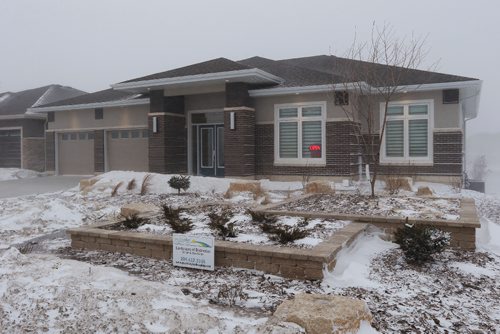 1JOHN WOODS / WINNIPEG FREE PRESS
141 Rose Lake Court, a hospital fundraising lottery prize, is a former show home which sold for $1.4 million is photographed Tuesday, March 8, 2017. Some luxury home buyers are buying now to avoid paying Winnipeg's new growth fee that comes into effect May 1.