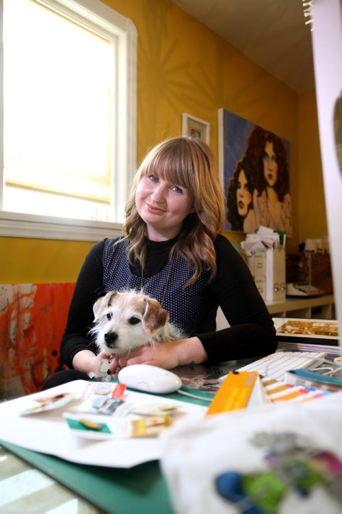 RUTH BONNEVILLE / WINNIPEG FREE PRESS

This is for an Intersection piece on Kristin McPherson's biz  Happy Land Print Shop, which markets cheeky posters, pins and patches targeting different neighborhoods around town and Wpg Icons.   Photos of Kristin and her dog, Clementine in her home office with close-up shots of some of her pins, (social drink tickets, perogies, garbage mitts etc.  
See Dave Sanderson story.  
  March 08, 2017