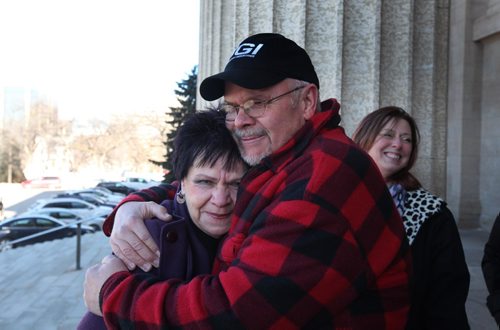 RUTH BONNEVILLE / WINNIPEG FREE PRESS

Robin Milne, 60, from Sprague, Man., a community tucked in the southeastern corner of the province and about four kilometres from the Canada-U.S. border. gives his sister Judy a hug after leaving the Manitoba Legislative Building today after finding out that his medical bill of over $100,000 that he incurred while suffering a heart attack and being taken to a US facility for treatment.  

See Nick Martin story. 
 March 09, 2017