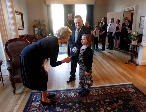PHIL HOSSACK / WINNIPEG FREE PRESS  -  Her Honor Janice FIlmon greets Tatum Preteau and her father Steven at Government House Thursday. Tatum and Steven both took part in a near drowning rescue in Vassar Manitoba last July 2016 and were at Government House to Accept awards for their part in saving a life in the event. See release. -  March 9, 2017