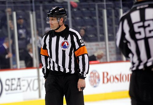 PHIL HOSSACK / WINNIPEG FREE PRESS  - AHL referee Chris Schlenker oversees a game between the Manitoba Moose and the Charlotte Checkers Thursday evening at the MTS Centre. See Mike Sawatzky story.  story. . -  March 3, 2017