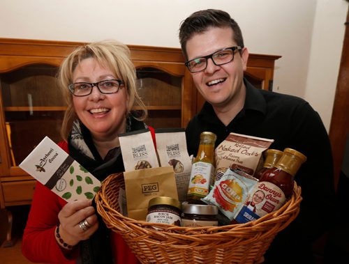 WAYNE GLOWACKI / WINNIPEG FREE PRESS

Food. Peter Fehr from Gourmet Inspirations and founder of Love Local MB and Sherry Sobey from Generation Green, retail sponsor for Love Local MB  with a basket of samples from the vendors taking part in the event featuring local food artisans . Wendy King Story. March 10    2017