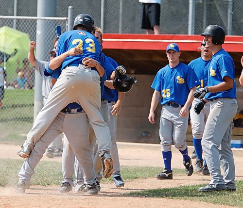 BORIS MINKEVICH / WINNIPEG FREE PRESS  080927 St. Boniface Legionaires players celebrate after #33 Evan Hardman scores the winning run against Elmwood.