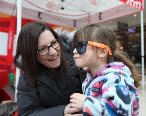RUTH BONNEVILLE / WINNIPEG FREE PRESS

Maisy Jacques (21/2yrs), tries on sunglasses she won while participating in a kids ball-throwing event at the Canada Summer Games  volunteer recruitment booth at centre court at Polo Park Saturday. 


March 11th, 2017 
Ruth Bonneville 
Winnipeg Free Press 
