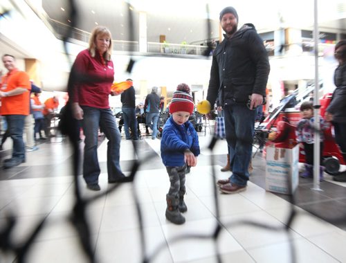 RUTH BONNEVILLE / WINNIPEG FREE PRESS

Logan Van De Graat  (21/2yrs), throws a ball into a basket at a kids event at the Canada Summer Games  volunteer recruitment booth at centre court at Polo Park Saturday. 


March 11th, 2017 
Ruth Bonneville 
Winnipeg Free Press 
