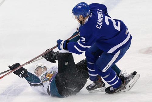 JOHN WOODS / WINNIPEG FREE PRESS
Manitoba Moose Jimmy Lodge (17) gets hit by Toronto Marlies' Andrew Campbell (2) during first period AHL action in Winnipeg on Sunday, March 12, 2017.