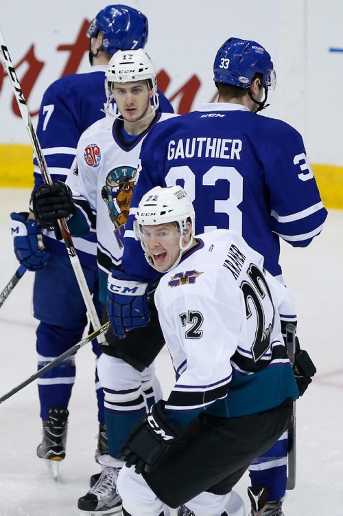 JOHN WOODS / WINNIPEG FREE PRESS
Manitoba Moose Darren Kramer (22) and Jimmy Lodge (17) celebrate Nelson Nogier's (36) goal against the Toronto Marlies during first period AHL action in Winnipeg on Sunday, March 12, 2017.