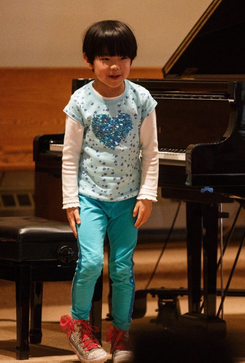 MIKE DEAL / WINNIPEG FREE PRESS
Daphne Chen gets up to bow after performing in the Piano Solo, Canadian Composers, grade 1 class at Sterling Mennonite Fellowship on Dakota Street during the 99th annual Winnipeg Music Festival which goes until March 19th.
170312 - Sunday, March 12, 2017.